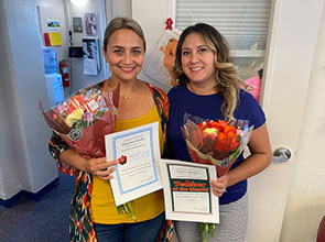 Taylor Spence and Danitza Garcia proudly holding their awards