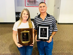 Kimberly Franklin and Alvaro Monteverde proudly holding their awards