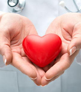 doctor holding heart shaped ball