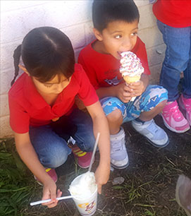 two students eating ice cream